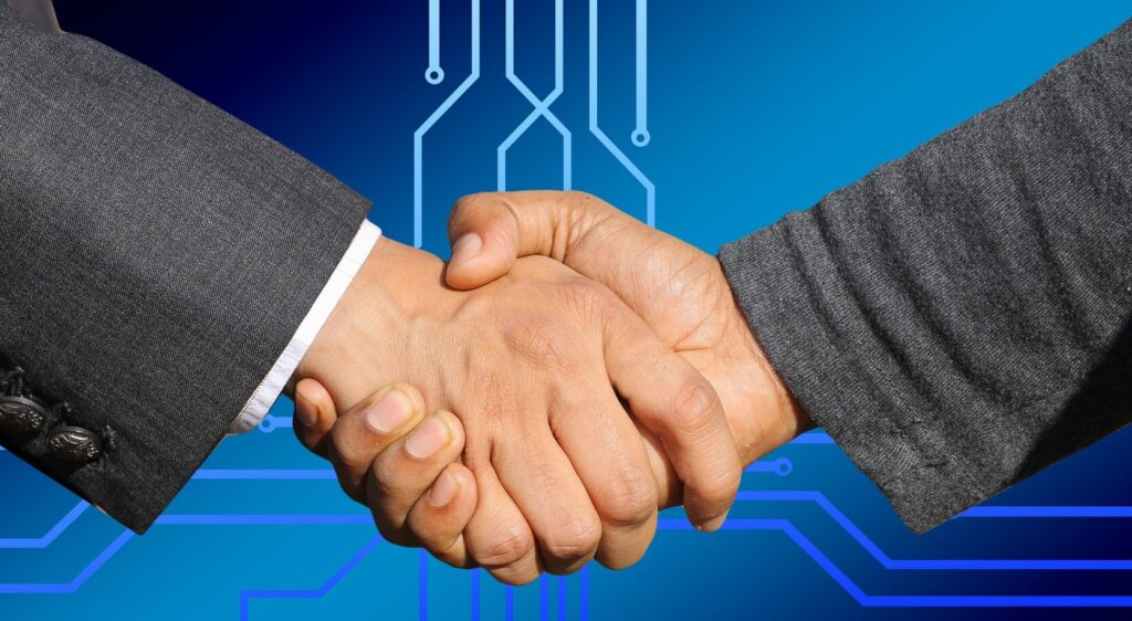 握手する男性の手